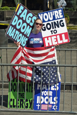 Photograph of member from the Westboro Baptist Church at the United Nations headquarters in New York City, on the day of Pope Benedict's address to the UN General Assembly. Original photograph by David Shankbone. URL: http://blog.shankbone.org/about/